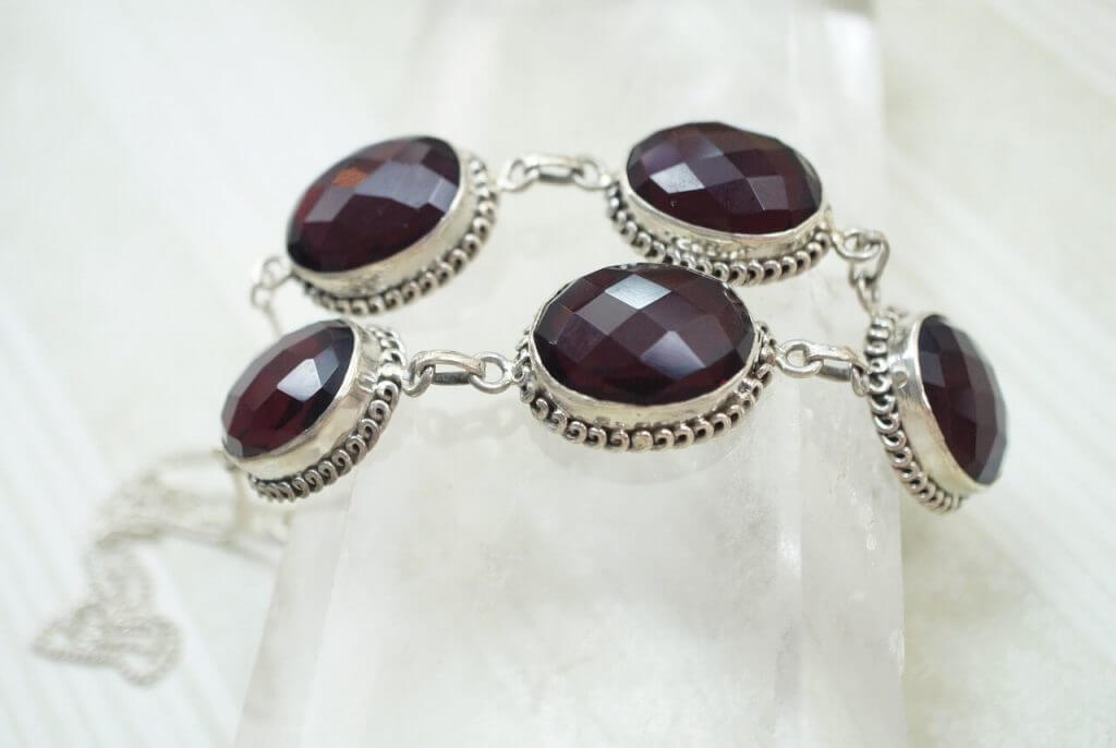 This Necklace with Garnet Set in Silver